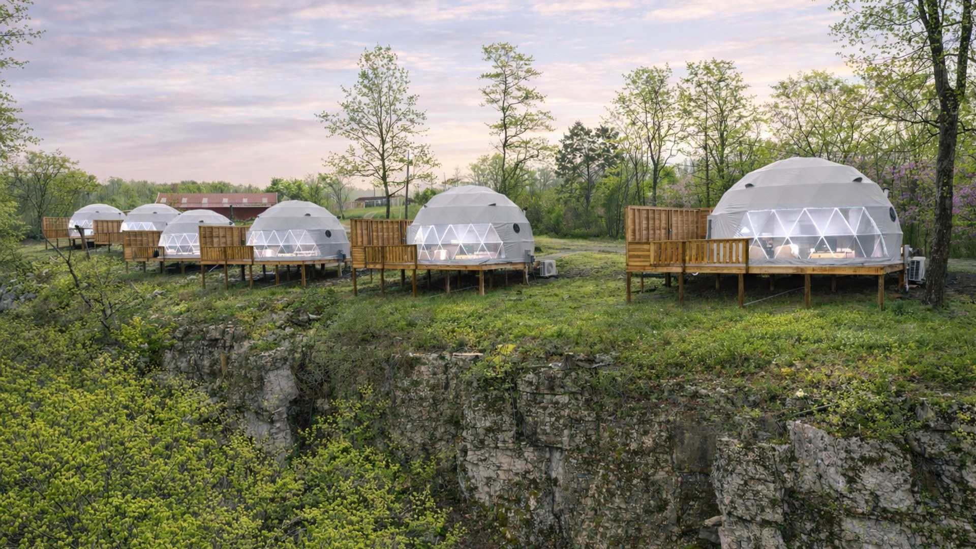 Geodesic glamping domes overlooking the Red River Gorge at golden hour